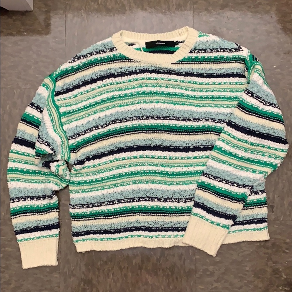 Navy, green, and white textured sweater